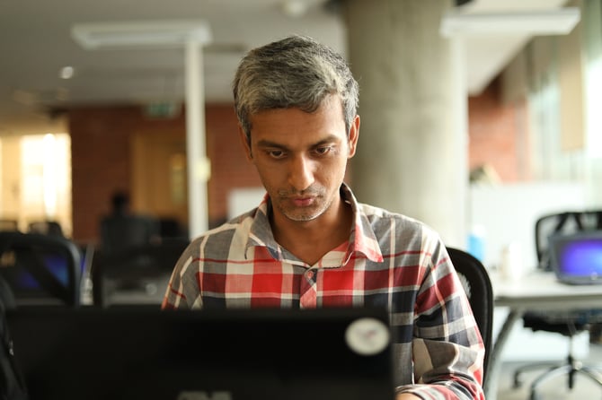 Man learning at laptop