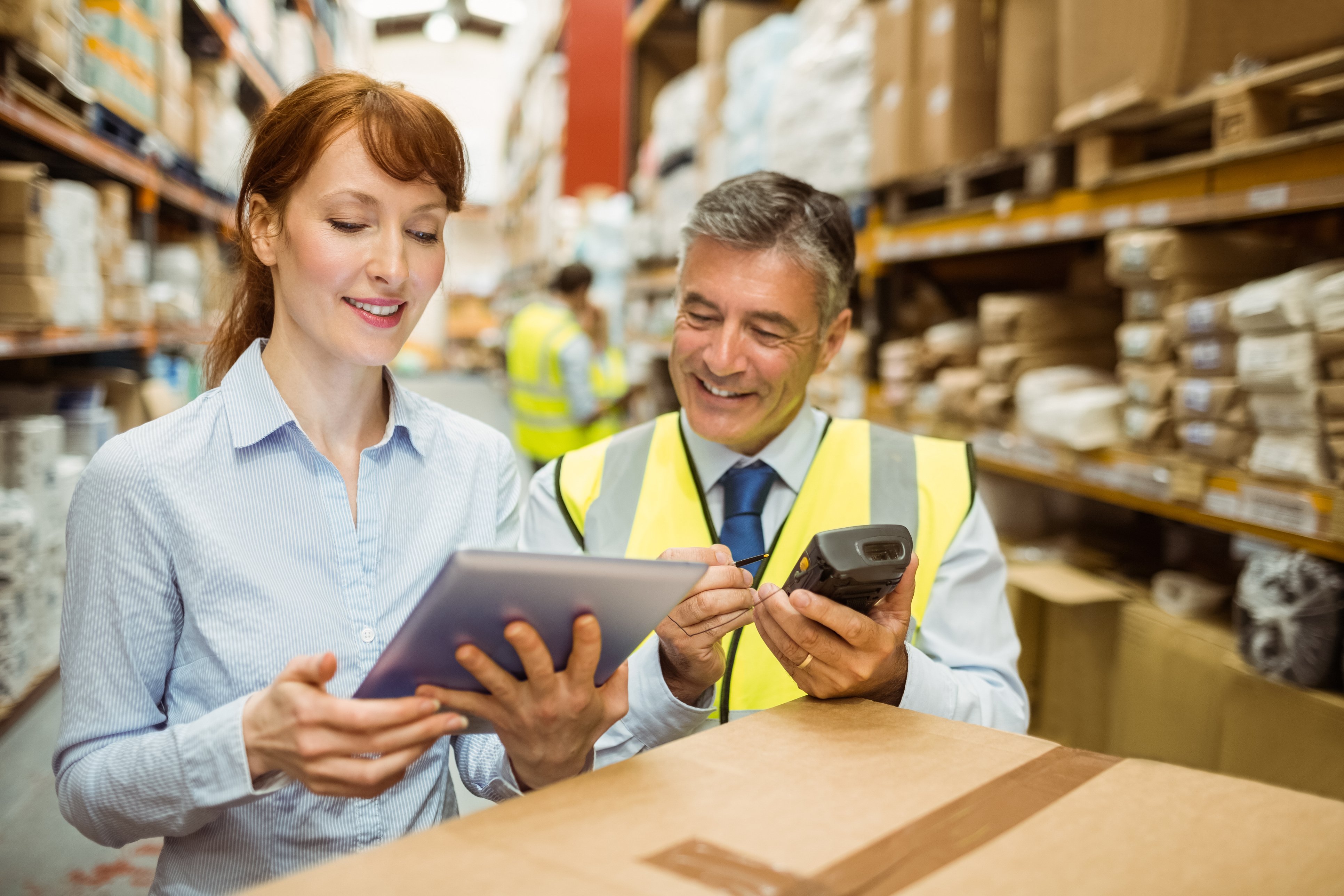 Industrial distributor team manages product inventory.